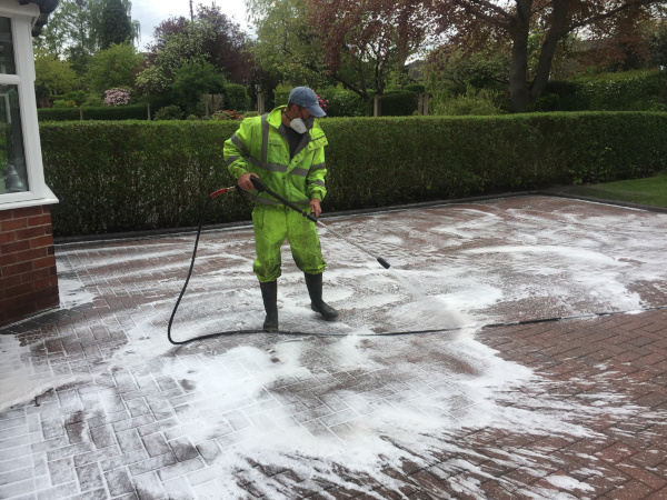 Power washing driveway.